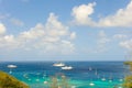 Yachts and cruise ships anchored at an idyllic bay in the caribbean Royalty Free Stock Photo