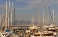 Yachts in dock against Vesuvius volcano. Boats in harbour in Naples Napoli, Italy. Sailing and travel concept. Neapolitan landmark Royalty Free Stock Photo