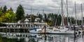 Yachts in docked in the Boatyard Marina at Stanley Park.