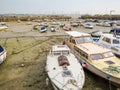 Yachts in a harbour during outflow Royalty Free Stock Photo