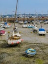 Yachts in a harbour during outflow Royalty Free Stock Photo