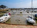 Yachts in a harbour during outflow Royalty Free Stock Photo