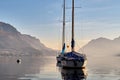 Yachts on a lake Como, Italy. Aerial panoramic view to the luxury yacht - famous old Italy town on bank of Como lake. Landscape