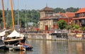 Yachts moored in Bristol Docks looking towards an old Victorian Pumping House, Bristol