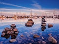 Yachts moored at the marina at the sunset