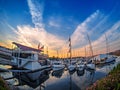 Yachts moored at the marina at the sunset