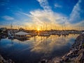 Yachts moored at the marina at the sunset