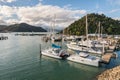 Yachts moored in Picton marina with Marlborough Sounds in background, New Zealand Royalty Free Stock Photo