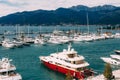 Yachts are moored at the pier. Porto, Montenegro