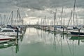 Yachts and motor boats docked in Half Moon Bay marina on a calm day Royalty Free Stock Photo