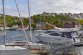 Kristiansund, Norway - 24th July 2011: Yachts and Motor Boats moored alongside the quay on a bright sunny day. Royalty Free Stock Photo