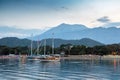 Yachts near the shore of the resort city in the evening