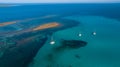 Yachts near the Spiagga La Pelosa beach in the north-west of Sardinia. Village of Stintino, Sassari Province, Sardinia, Italy Royalty Free Stock Photo