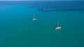 Yachts near the Spiagga La Pelosa beach in the north-west of Sardinia. Village of Stintino, Sassari Province, Sardinia, Italy Royalty Free Stock Photo