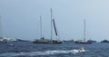Yachts participants of Yacht show stand at port Oat-flakes along the coast, expecting viewing of clients, brokers and