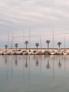 Yachts in port with palm trees in Sitges, Spain Royalty Free Stock Photo