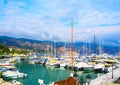 Yachts in port of Saint-Jean-Cap-Ferrat - resort and commune in southeast of France on promontory of Cote d`Azur in Provence-Alpe Royalty Free Stock Photo