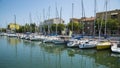 Yachts in the port waiting. Embankment in Rimini, Italy - June 2