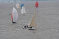 Yachts racing close hauled to each other