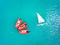 Yachts and rescue speed boats anchored in clear blue sea Royalty Free Stock Photo