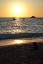 Yachts sail on the sea near a sunny path at sunset. View from the Kabak beach in Turkey. Royalty Free Stock Photo