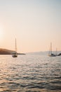 Yachts sailing in Aegean sea sunset view beautiful landscape travel yachting tour Royalty Free Stock Photo