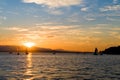 Yachts sailing at sunset