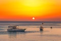 Yachts in a sea under sunset sky Royalty Free Stock Photo