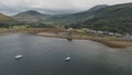 Yachts, ships, boats at Scotland ocean aerial. Seascape of sea bay at Arran Island, United Kingdom