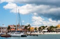 Yachts and small boats for fishing and snorkeling next to a pier Royalty Free Stock Photo