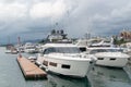 Speed boats at harbor. Power boats moored in marina. Sea coast pier Royalty Free Stock Photo