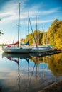 Yachts standing on the dock at the lake Galve in Trakai Royalty Free Stock Photo