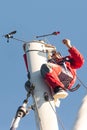 The yachtsman climbed the mast