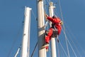 The yachtsman climbed the mast