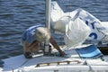 Yachtsman setting sail of a yacht before race