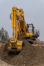 Komatsu PC1250 excavator working in an open-pit gold mine.