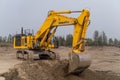 Komatsu PC1250 excavator working in an open-pit gold mine.