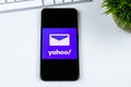 Yahoo Mail app logo on a smartphone screen.