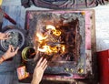 Yajna hindu holy rituals with fire from top angle at day