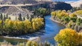 Yakima River winds through yellow trees in Kittitas County during fall Royalty Free Stock Photo