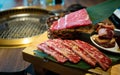 Yakiniku Japanese bbq with raw beef meat dish on the side Royalty Free Stock Photo