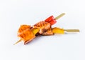 Yakitori Salmon Skewers with bell pepper served with sauce isolated on white background