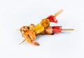 Yakitori Seafood Skewers with bell pepper, black tiger shrimp, scallop and salmon fillet served with sauce isolated on white Royalty Free Stock Photo