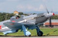 Yakovlev Yak-3M World War II fighter aircraft D-FYGJ with a pilot dressed in period uniform Royalty Free Stock Photo