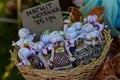 Yakushyntsi, Ukraine,: handmade amulet toy in wooden basket, Ukrainian rag doll, Podillia ornament clothes Royalty Free Stock Photo