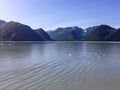 ,yakutat ,alaska usa mountains and small icebergs floating in the water ,a view from cruise ship Royalty Free Stock Photo