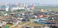 Top view of buildings of the city on a summer day. New and old districts of the city of Yakutsk