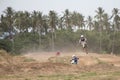 Yala, Thailand - APRIL 20, 2014: Motorcross riders jump in Yala