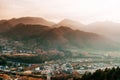 Yamadera town in mountain valley under evening sunlight through foggy atmosphere, Yamagata - Japan Royalty Free Stock Photo