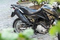 A Yamaha Crosser xtz 150 motorcycle stops on a street in Pelourinho, the historic center of the city of Salvador, Bahia Royalty Free Stock Photo